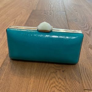 Trina Turk for banana republic Clutch.  Turquoise shell with white gem clasp